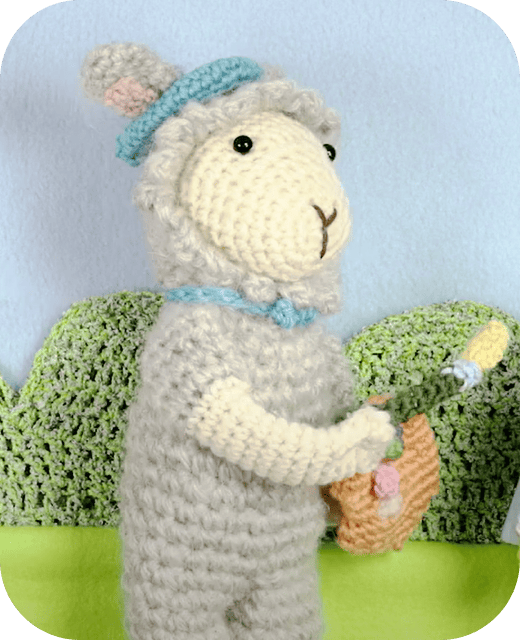 アルパカ・ダ・ヴィンチ(半立体の編みぐるみ)が絵を描いている画像